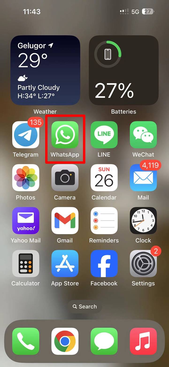 Screenshot of an iPhone screen with the WhatsApp app's icon highlighted.